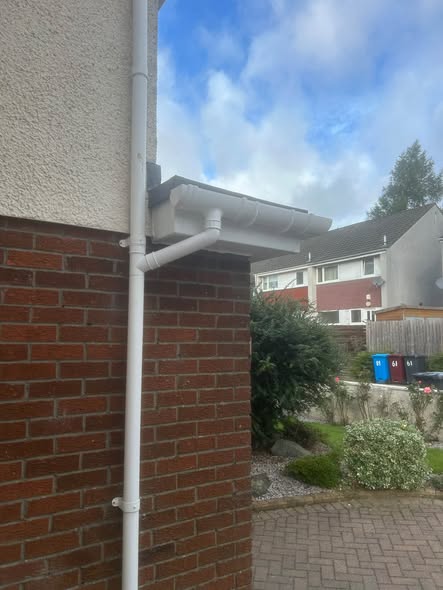 UPVC fascia, soffit and downpipe installed at a house