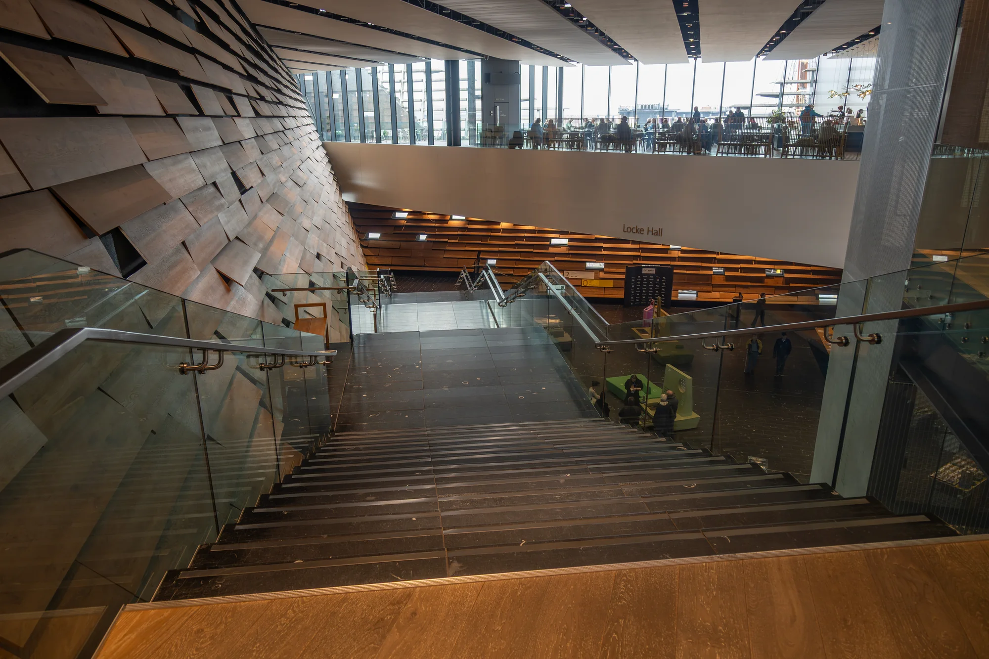 View down the staircase into the timber-lined Locke Hall at V&A Dundee
